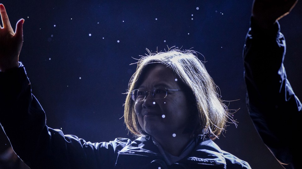 Tsai Ing-wen waves to supporters.