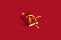 a hammer and sickle piercing a book against a red background