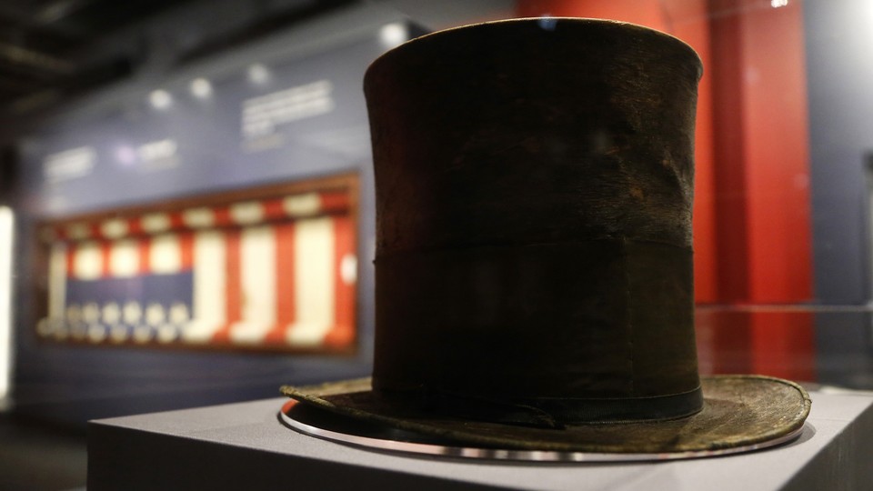 Abraham Lincoln's iconic silk top hat, which he was wearing the night he was assassinated, on display at Ford's Theatre in Washington, D.C.