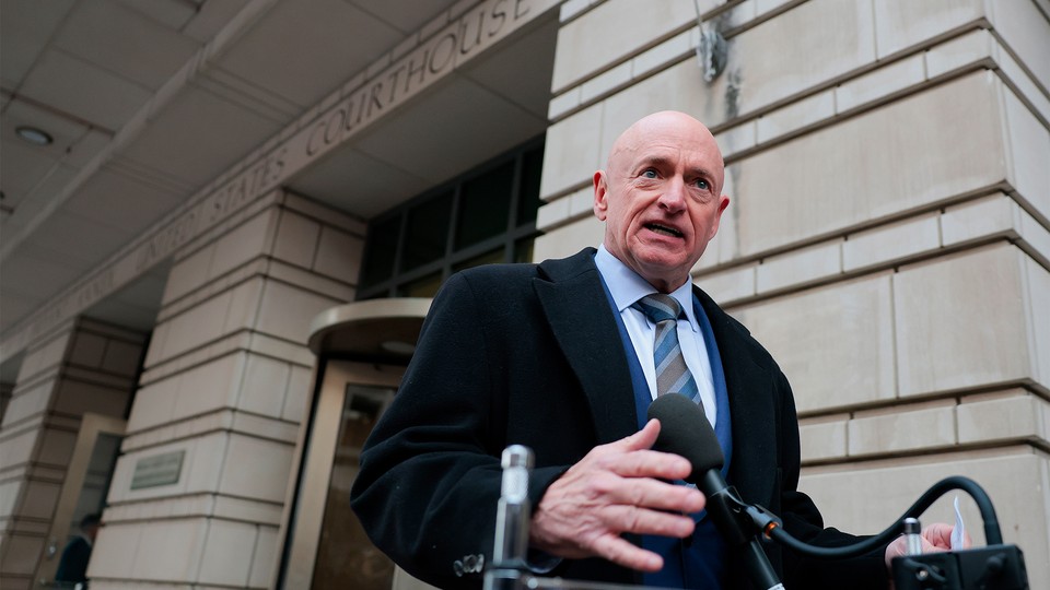 Mark Kelly outside a D.C. courthouse