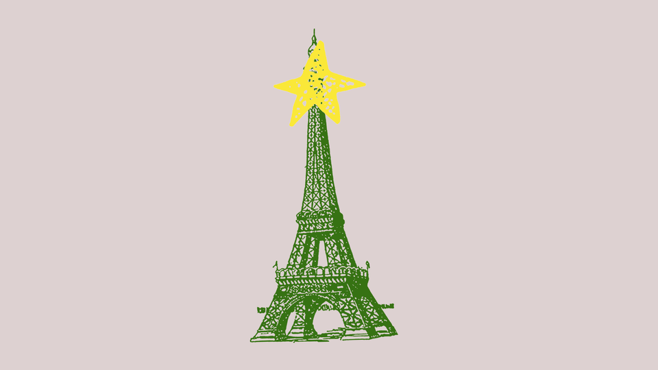 A green Eiffel Tower topped with a Christmas-tree star