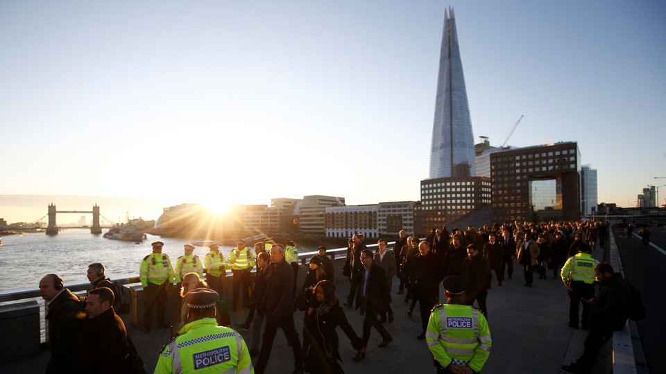 Londoners cross London Bridge after a 2019 terrorist attack.