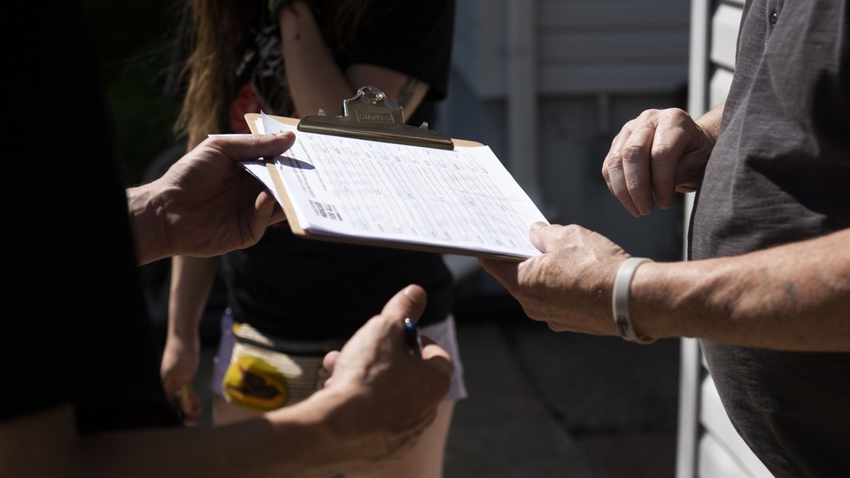 Voter canvassing with a clipboard
