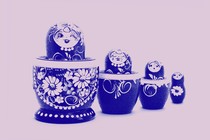 Four nesting dolls with a floral print
