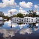 Travel trailers are inundated by floodwaters at the Peace River Campground on October 4, 2022 in Arcadia, Florida.