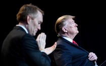 Senator James Lankford claps for US President Donald Trump during the National Prayer Breakfast