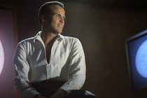 Performer Harry Belafonte poses on a television-studio set.
