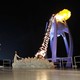 South Korean Olympic figure skating champion Yuna Kim lights the Olympic flame