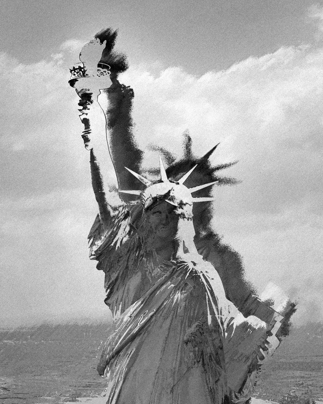 A blurred image of the Statue of Liberty