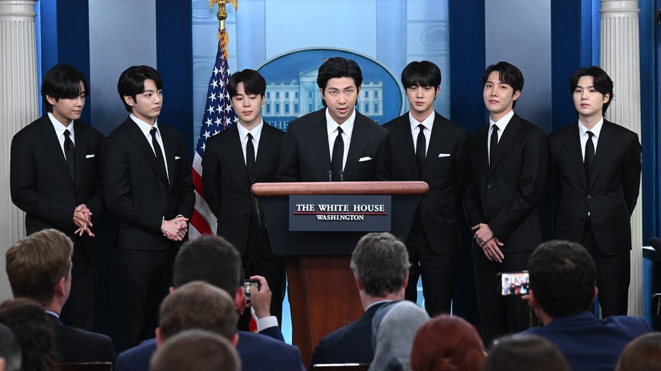 V, Jungkook, Jimin, RM, Jin, J-Hope, and Suga in the White House press briefing room