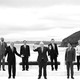 The leaders attending the G7 pose for a photograph on the coast.