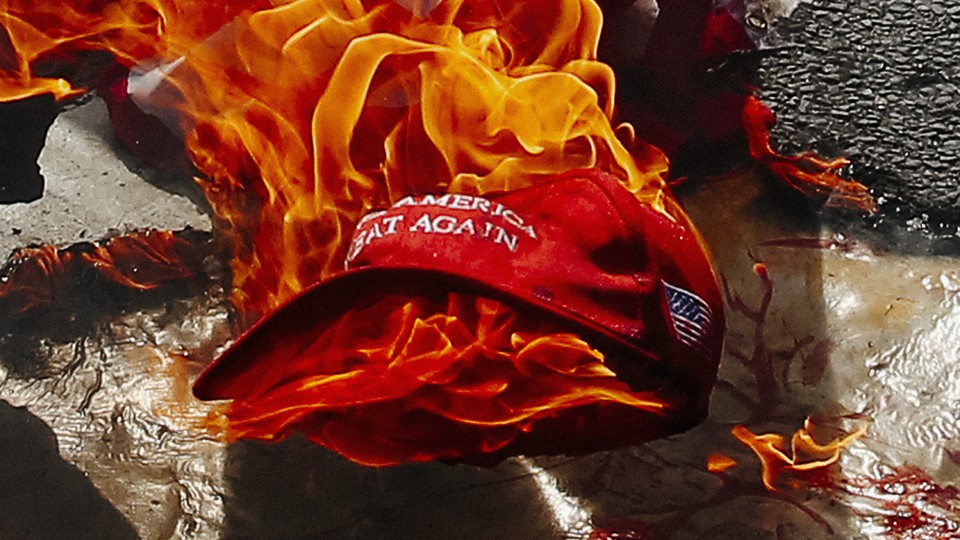 A MAGA hat on fire.