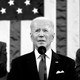 President Joe Biden is seen giving the State of the Union address with Kamala Harris and Nancy Pelosi in the background