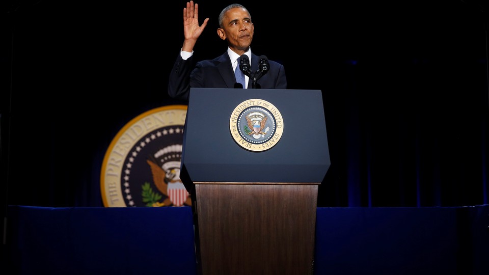 Obama waves at the end of his farewell address in Chicago