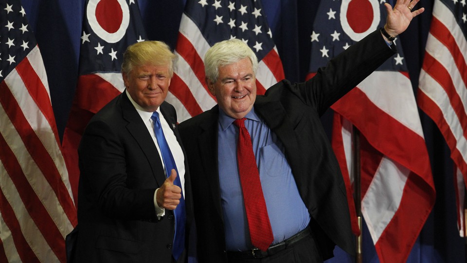 Newt Gingrich introducing Donald Trump in front of American flags during a 2016 rally in Ohio