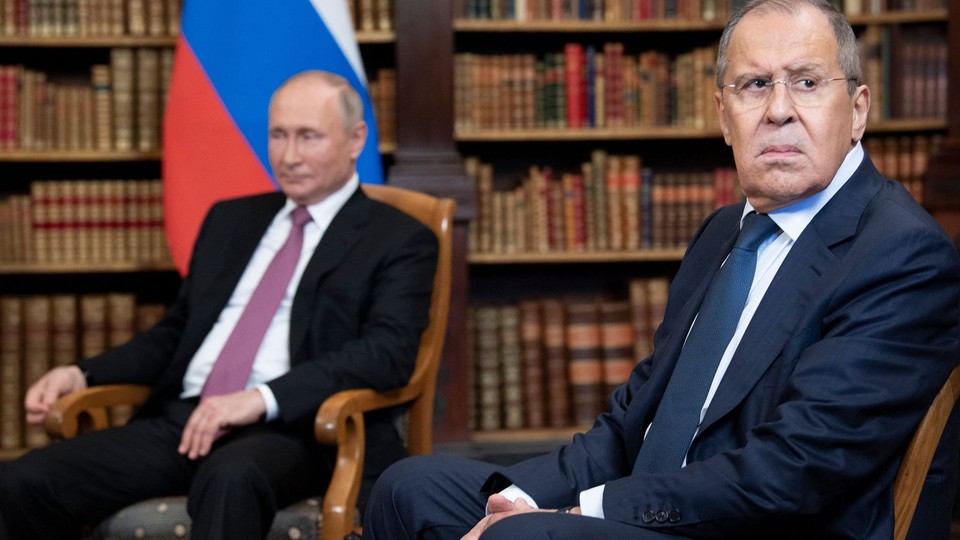 Russian Foreign Minister Sergei Lavrov and Russian President Vladimir Putin