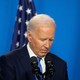 Photo of Joe Biden in front of microphones