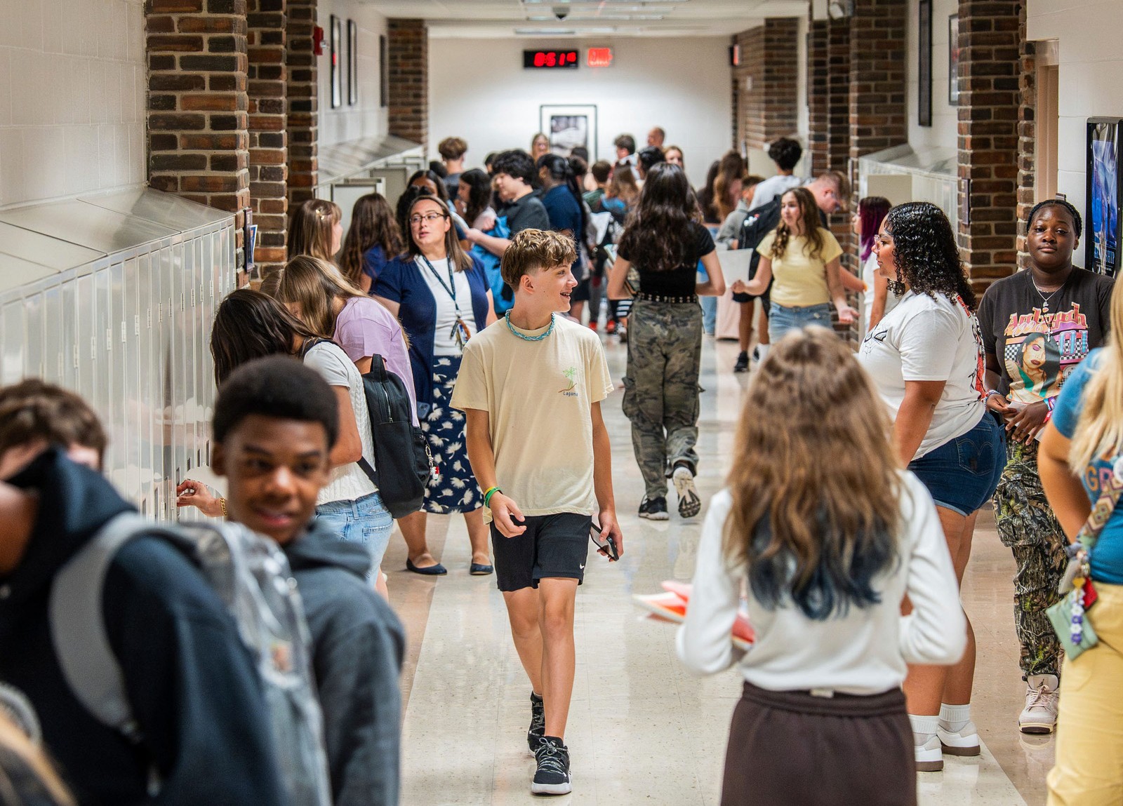 A bustling hallway inside a middle school