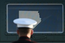 Photo of an American soldier from behind