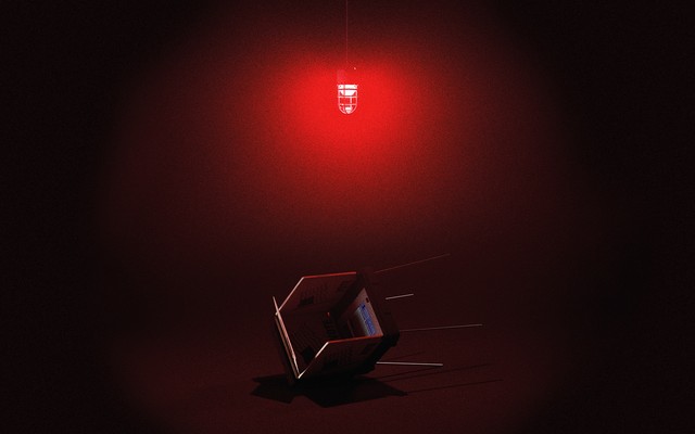 Fallen voting booth with red emergency light