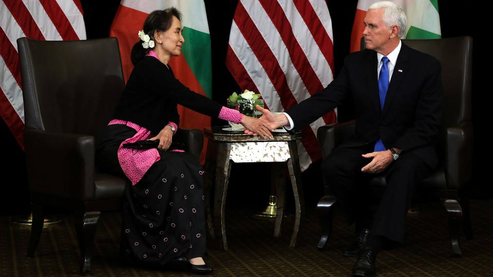 Myanmar State Counsellor Aung San Suu Kyi meets with American Vice President Mike Pence in Singapore on November 14.