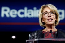 Betsy DeVos speaks at a conference