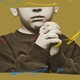 An image of a young boy praying