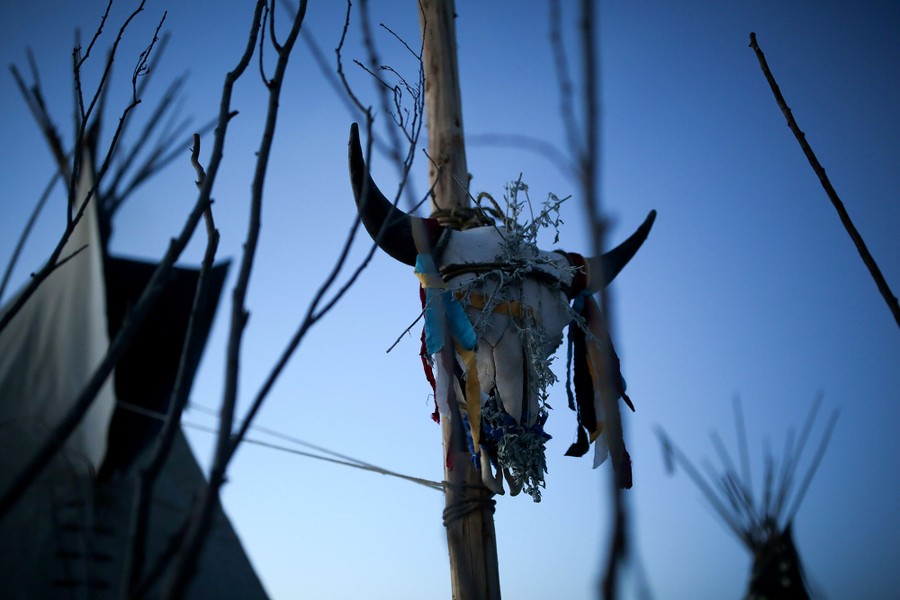 A cow's skull belonging to Chief Matthew Black Eagle Man of the Long Plain First Nation Manitoba hangs inside the Oceti Sakowin camp on December 4, 2016.