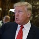 President-elect Donald Trump talks with reporters in Trump Tower in New York.