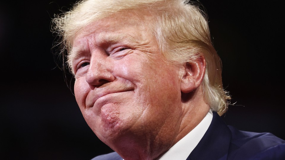A photograph of Donald Trump smiling