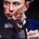 Photo of Elon Musk holding a chainsaw over his head onstage with a photo of himself projected on a screen behind him