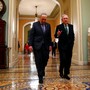 Senate Minority Leader Chuck Schumer and Senate Majority Leader Mitch McConnell walk to the chamber after collaborating on a budget agreement last week.
