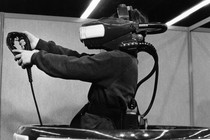 An image of a person wearing VR headset in 1995