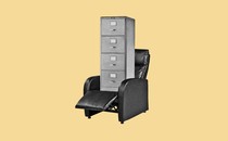 An illustration of a filing cabinet in a reclining chair