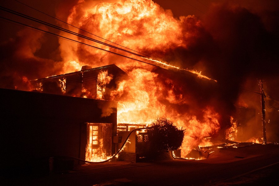 Multiple beachfront properties ablaze along the Pacific Coast Highway in Malibu during the Palisades Fire.