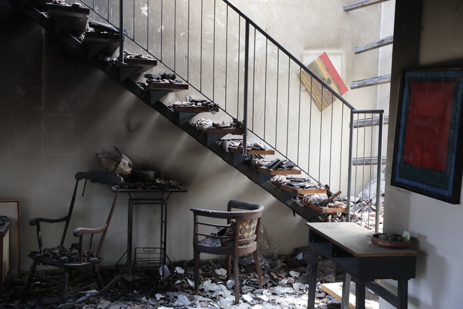 an interior staircase destroyed by the attack by Hamas.