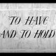 Still of a video that says "to have and to hold"