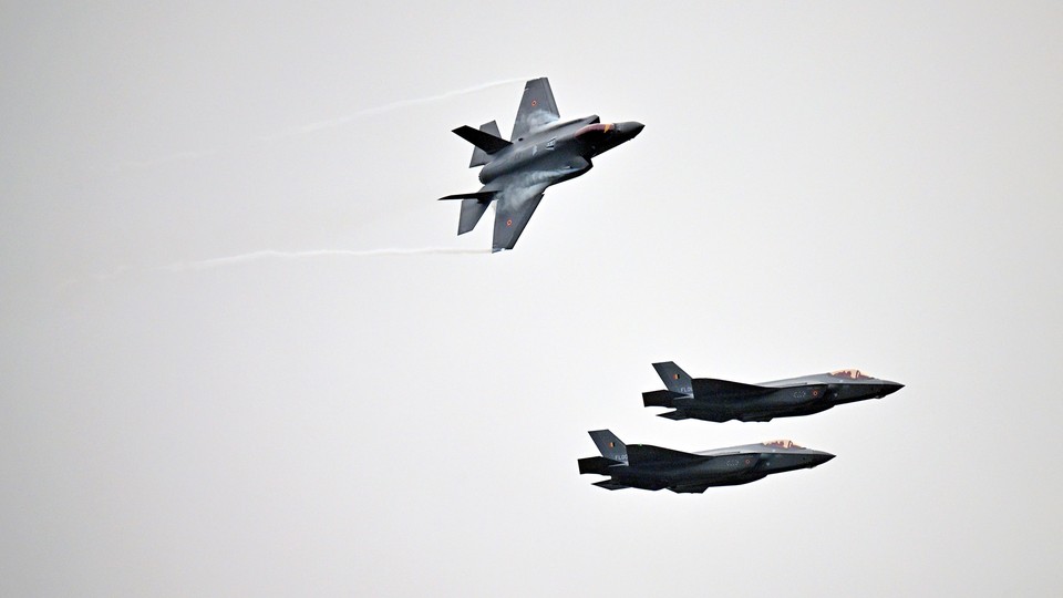 Fighter jets flying in formation over Belgium.