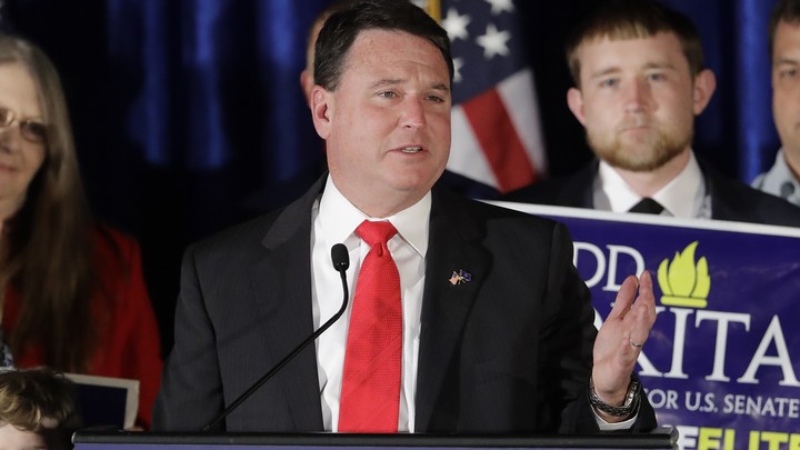 Representative Todd Rokita of Indiana speaking at a lectern