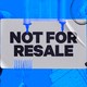 A "Not For Resale" sticker is juxtaposed on a Torah scroll, Star of David, menorah, and other symbols.