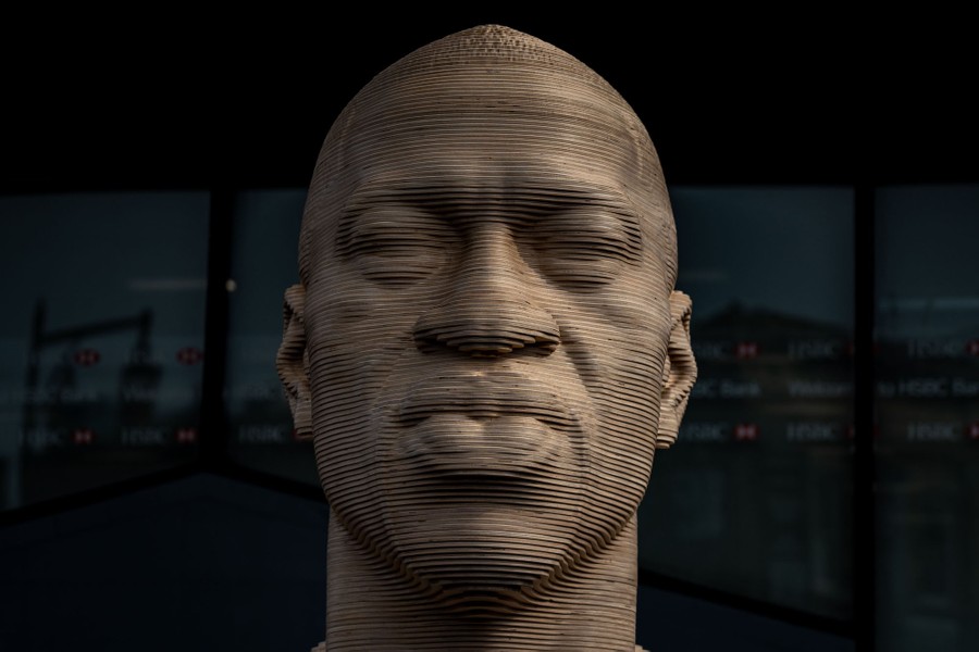 A large sculpture of the head of George Floyd