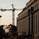 Photograph of construction project on the Fed building with a large crane
