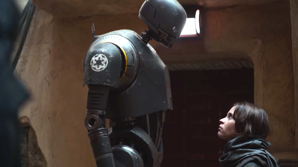 The droid K-2SO stares down Felicity Jones's character Jyn Erson in the 'Rogue One' trailer.