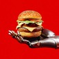 A robotic hand holds a cheeseburger