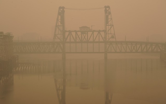 The Portland Steel Bridge covered in smoke from wildfires.