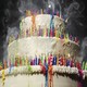 A birthday cake packed with colorful candles that have been blown out