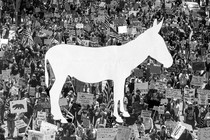 A donkey cutout in a photo of a No Kings protest