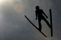 An Olympic skiier practices.