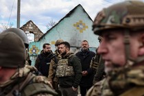 President Volodymyr Zelensky walking through Bucha, Ukraine