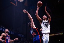 San Antonio Spurs Tim Duncan in action vs New York Knicks Chris Dudley.